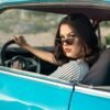 woman sitting in vehicle