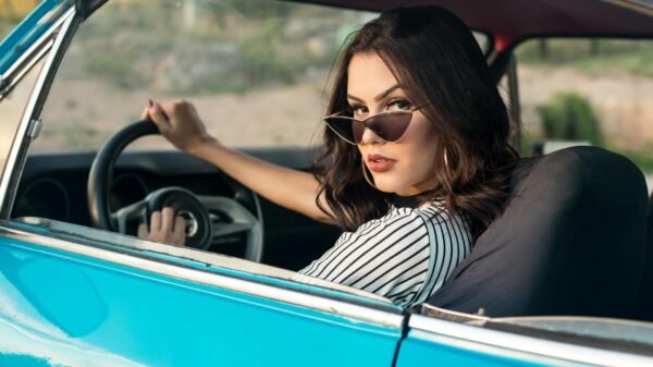 woman sitting in vehicle