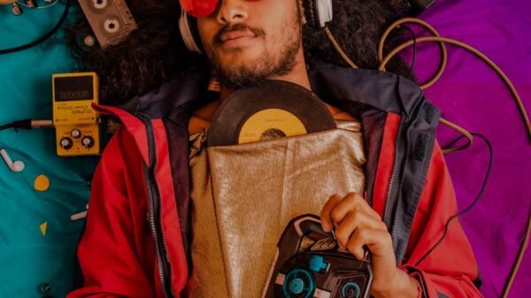 man listening to music with headphones