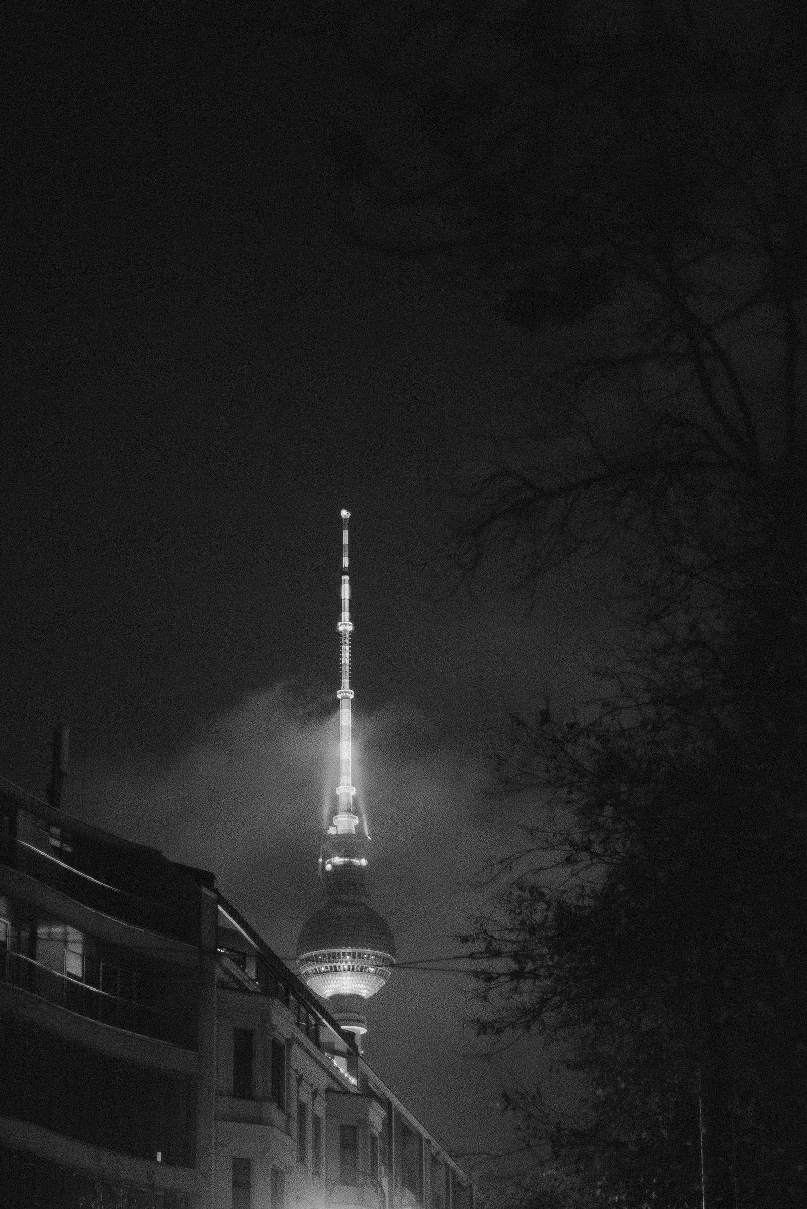 City skyline at night seen during travel, symbolizing life on the road later in life