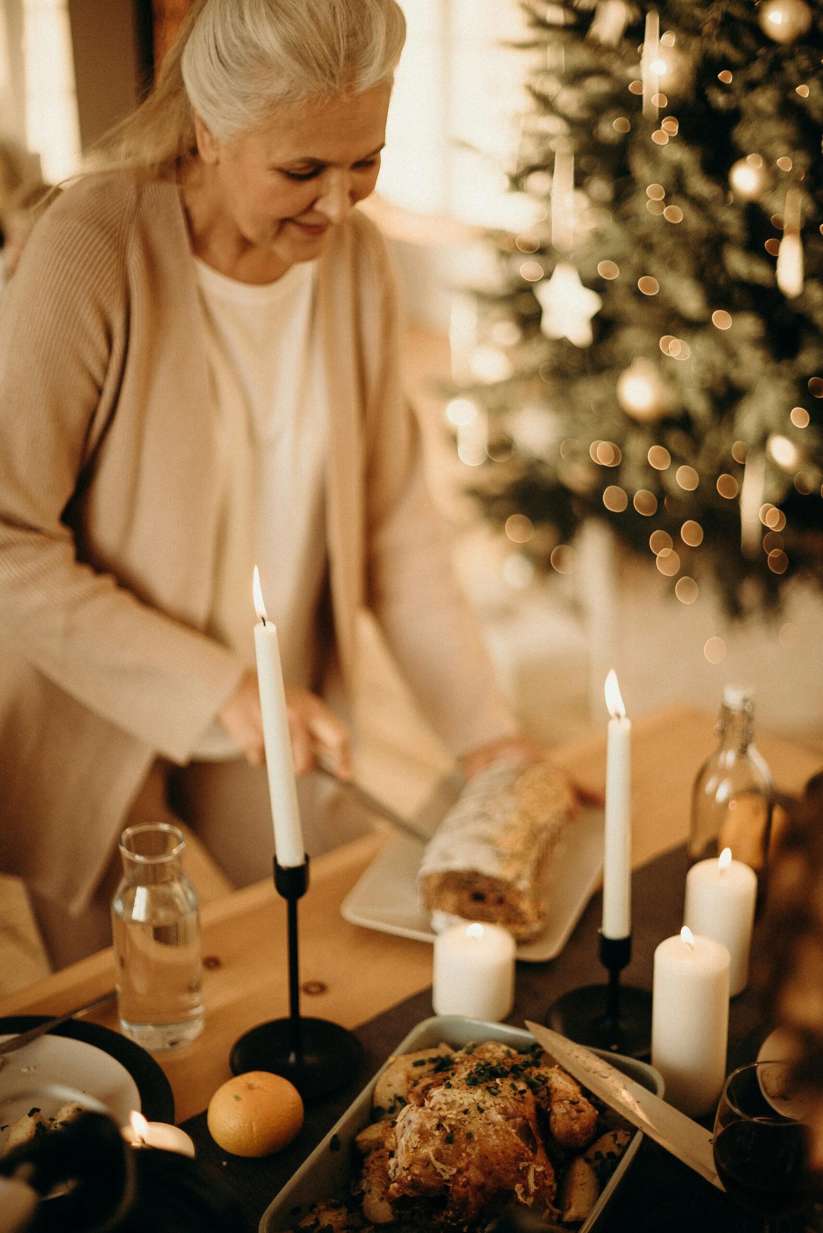 Older woman preparing a cozy candlelit meal at home, embracing simple traditions and a slower pace of life