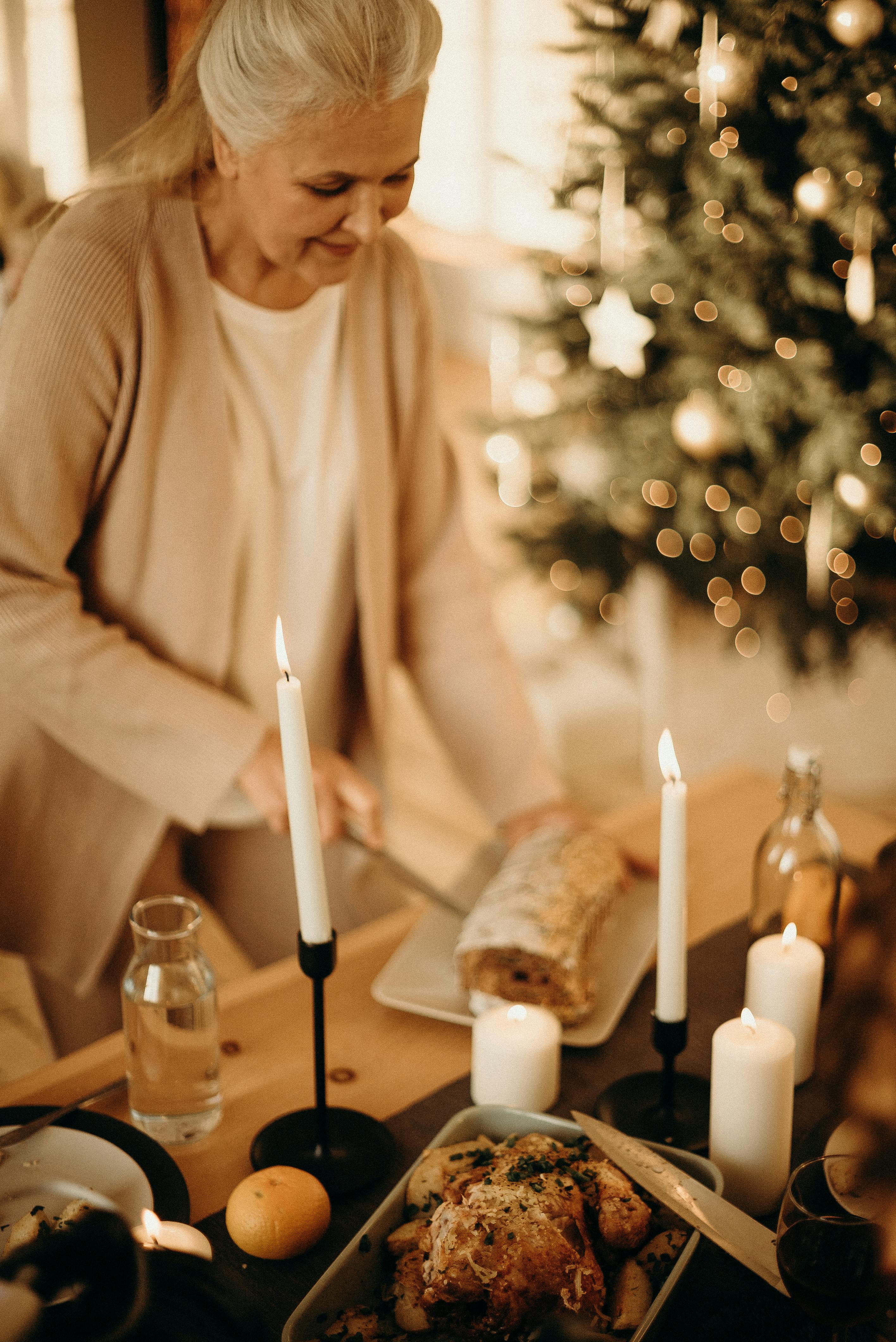 Older woman preparing a cozy candlelit meal at home, embracing simple traditions and a slower pace of life