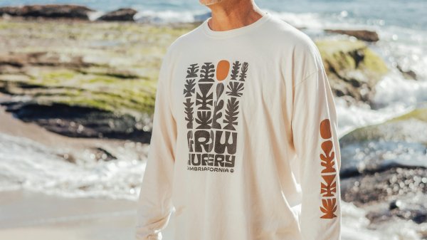 Middle-aged man enjoying a beach walk as part of an adaptive health routine