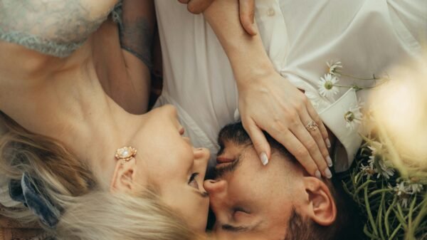Midlife couple experiencing pressure-free intimacy through gentle touch and emotional closeness