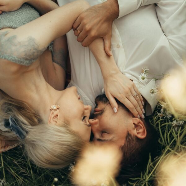 Midlife couple experiencing pressure-free intimacy through gentle touch and emotional closeness
