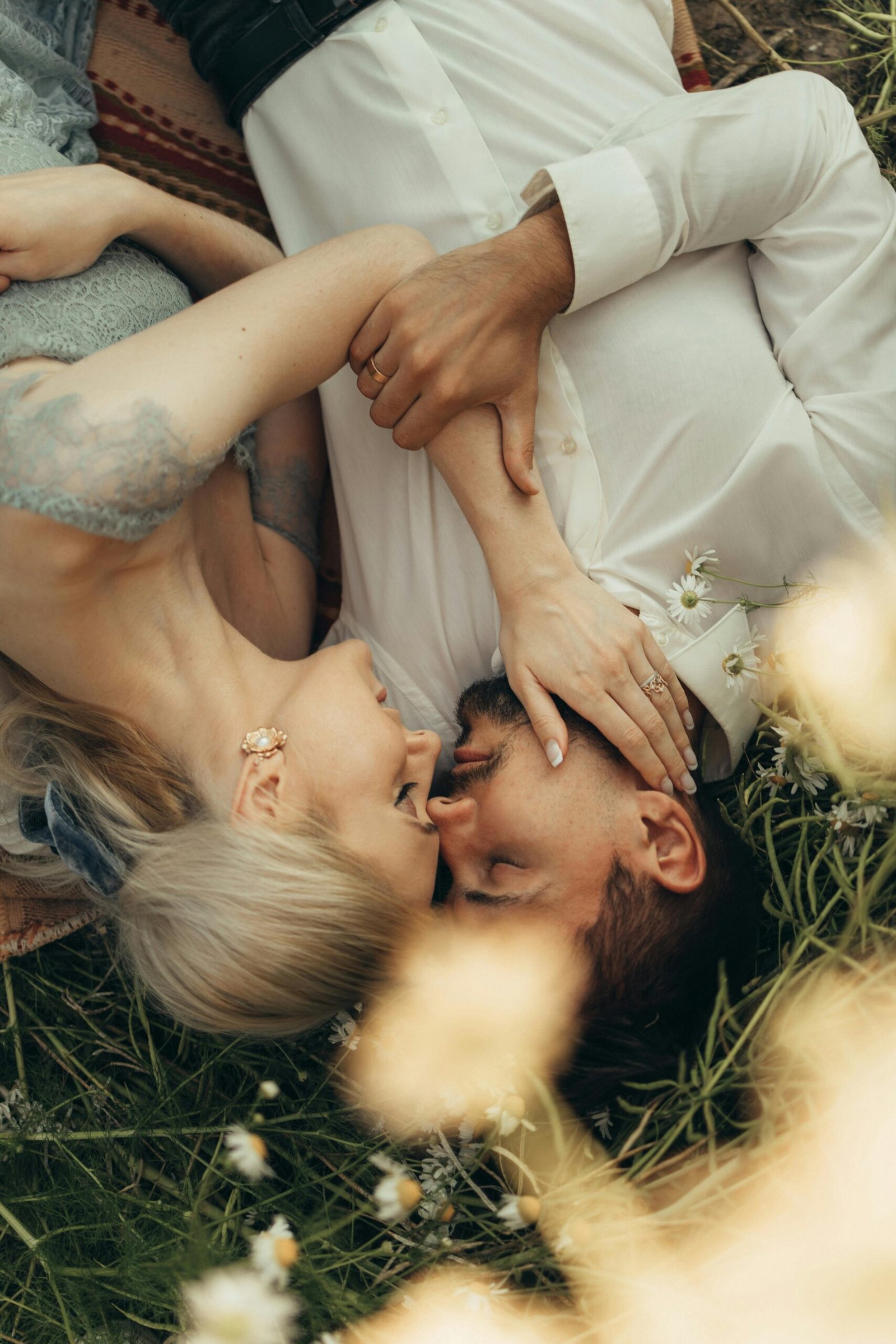 Midlife couple experiencing pressure-free intimacy through gentle touch and emotional closeness