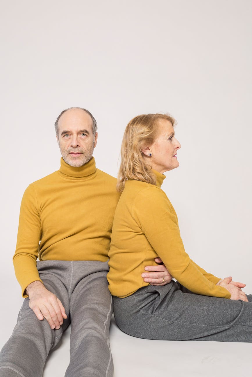 elderly couple wearing matching outfit